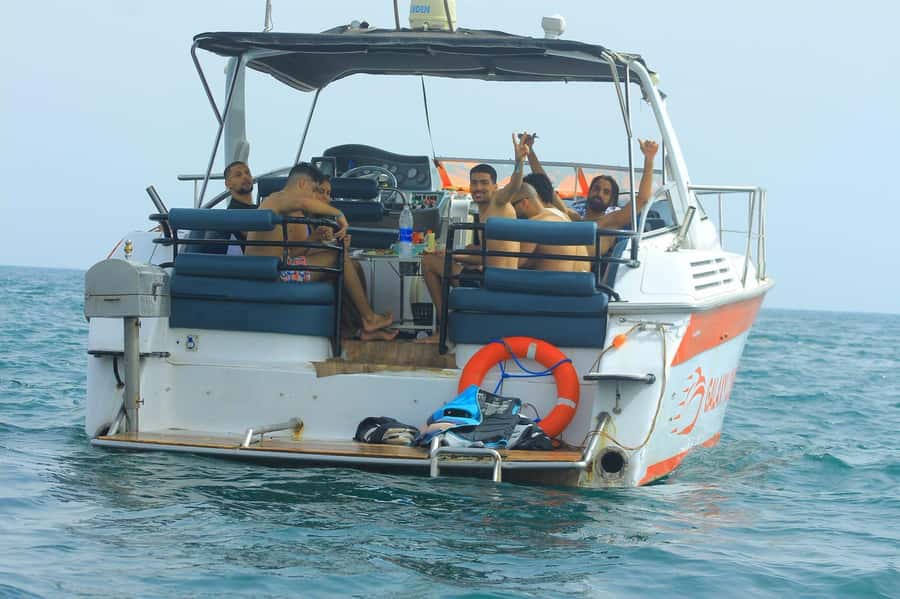 Agadir: Boat Tour with Lunch, Fishing & Jetski - Swimming and dolphin watching on the cruise: plan your towel moments