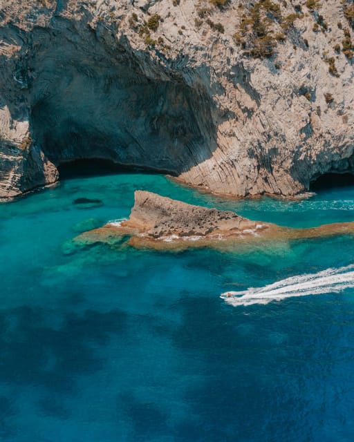 Alcudia: JetSki Tour Coll Baix beach & Caves (free Photos) - Riding the north coast toward Alcanada’s lighthouse