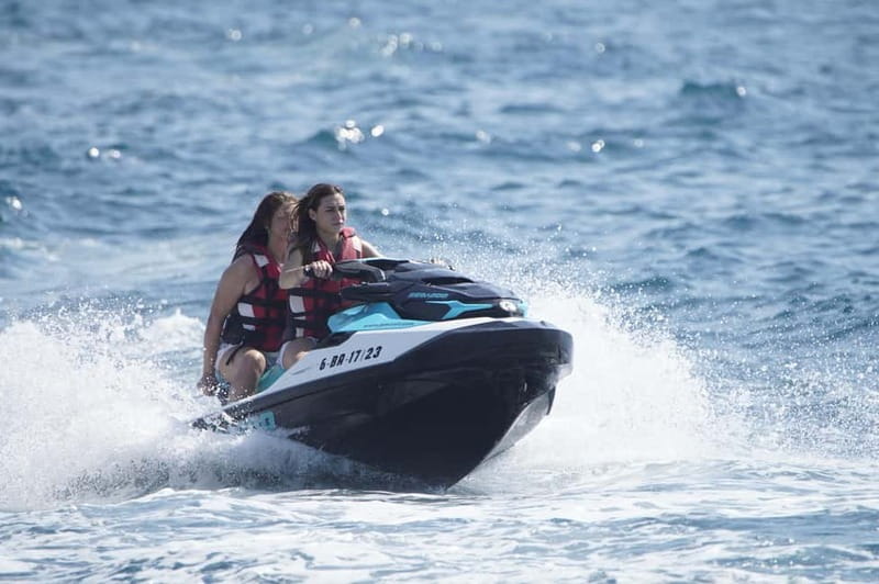 Barcelona: Jetski No Licence Tour Hotel W - Photo included - Barcelona Coastline by Jet Ski: W Hotel, Mapfre Towers, Ports, and Beaches