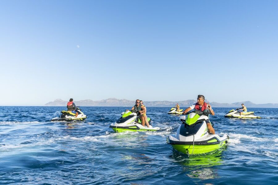 Mallorca: Alcudia Bay Jet Ski Tour - Aucanada’s white sand and green edges: your early payoff